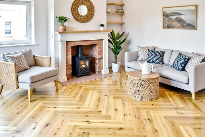 Natural oak herringbone floor styled in a living room