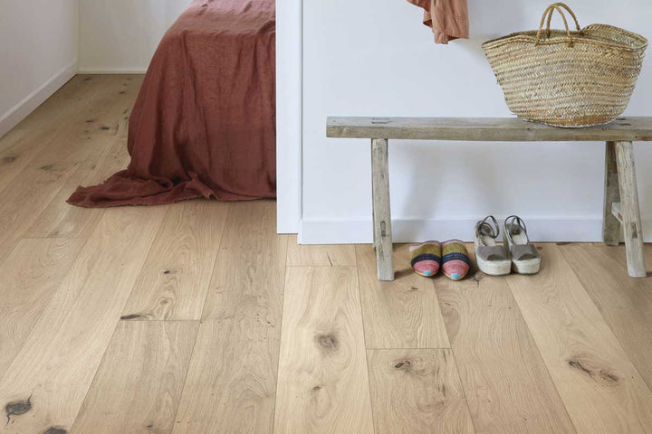 Kahrs Flora Oak Edelweiss flooring shown in a bedroom