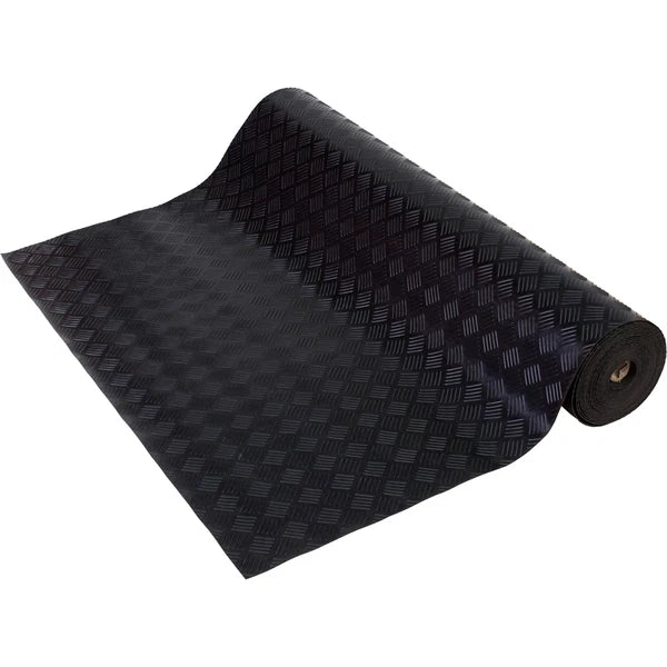 A black textured roll of material, likely a mat or protective sheet, partially unrolled to show a diamond-patterned surface, set against a plain white background.