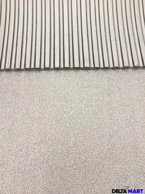 Close-up of a textured surface with a comb-like pattern