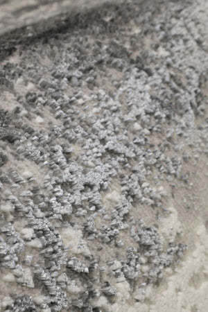 Close-up of textured stone surface with patterns