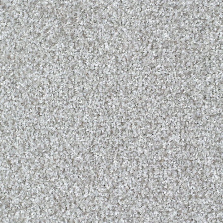 A close-up texture shot of a light gray loop-pile carpet or fabric surface.
