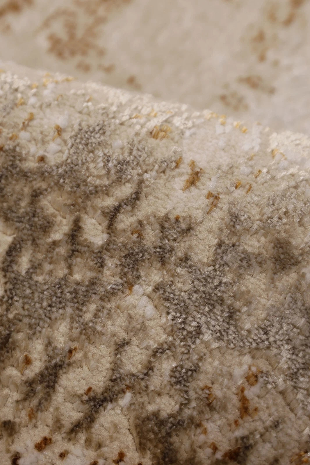 Close-up of a textured surface with brown and beige colors