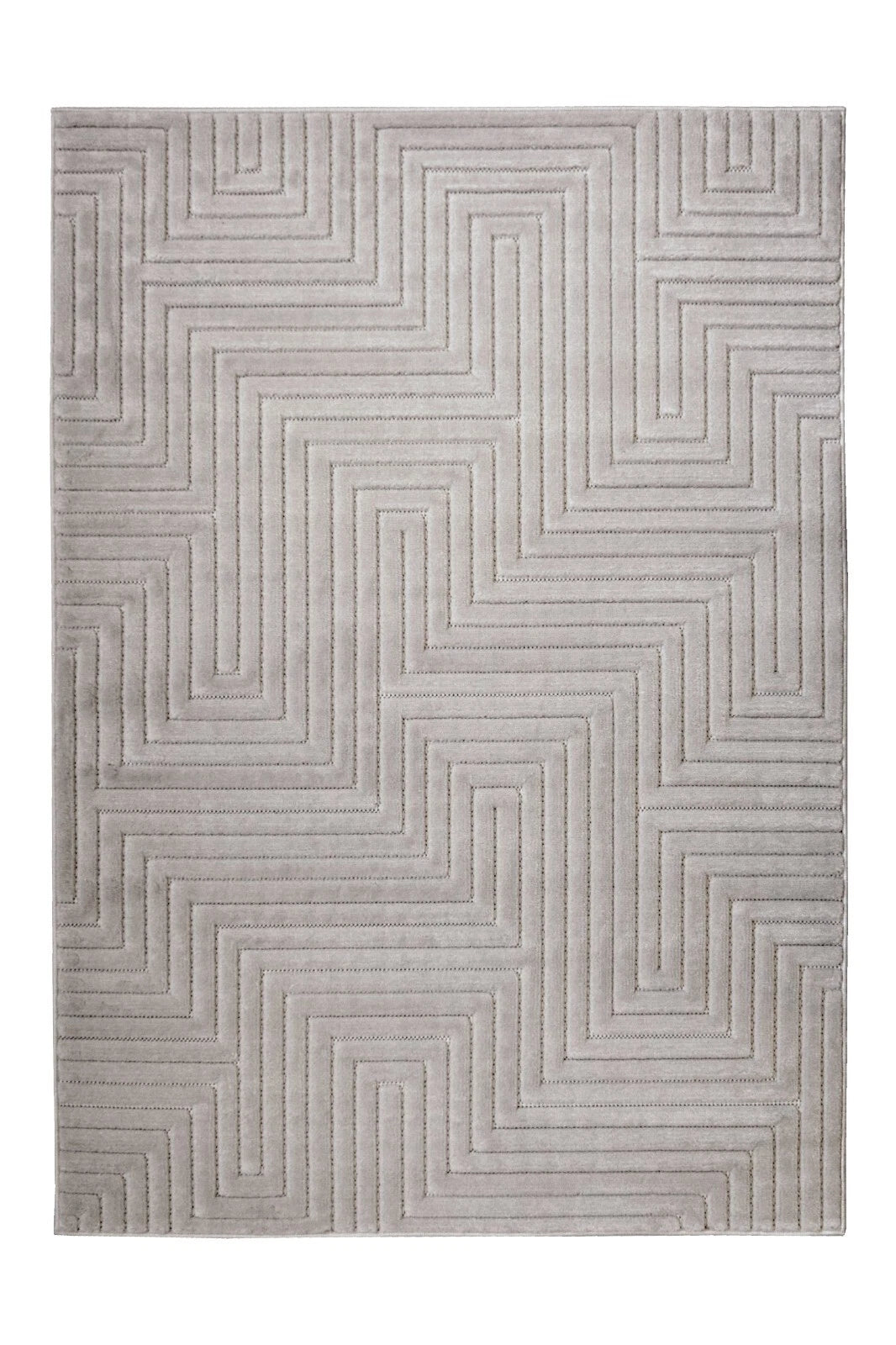 A rectangular area rug with a modern geometric pattern of raised, parallel lines forming a maze-like zigzag design in light gray and beige tones.