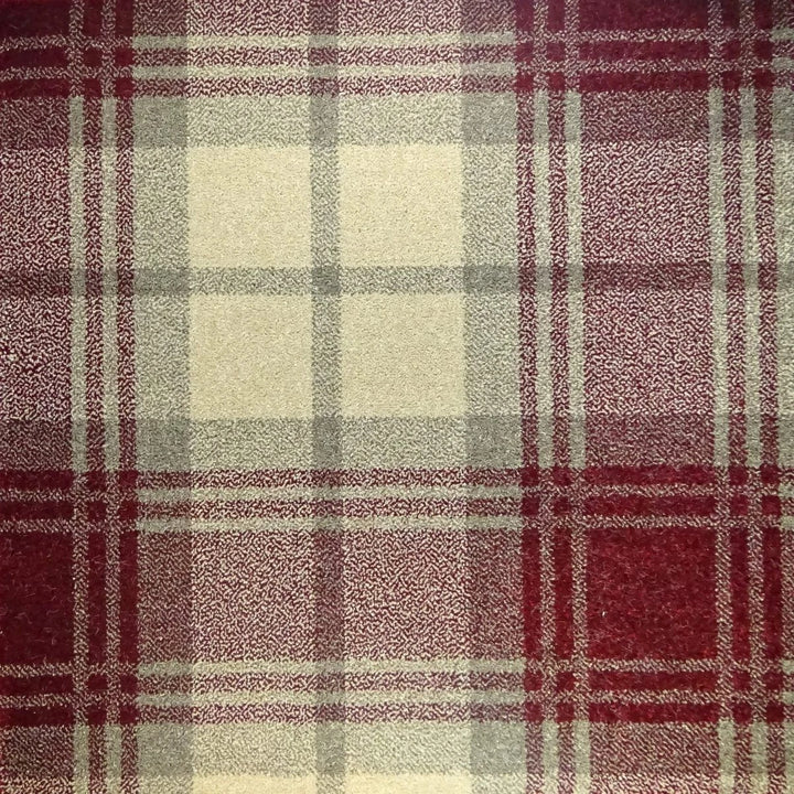 A close-up of a plaid fabric pattern with a textured, heathered finish. The design features intersecting stripes of deep red, warm beige, and light gray.