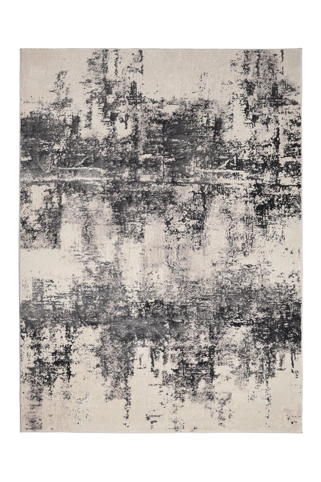Abstract patterned rug with black and gray tones on a white background