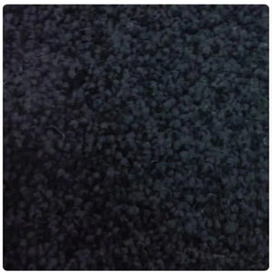 A close-up texture shot of a dark charcoal gray loop pile carpet, showing the dense, short fibers and subtle sheen.