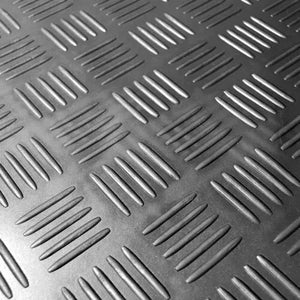 Textured gray surface with diamond plate pattern