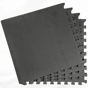 Top angle view of neatly stacked square soft EVA foam floor tiles for kids play or home gym setup.