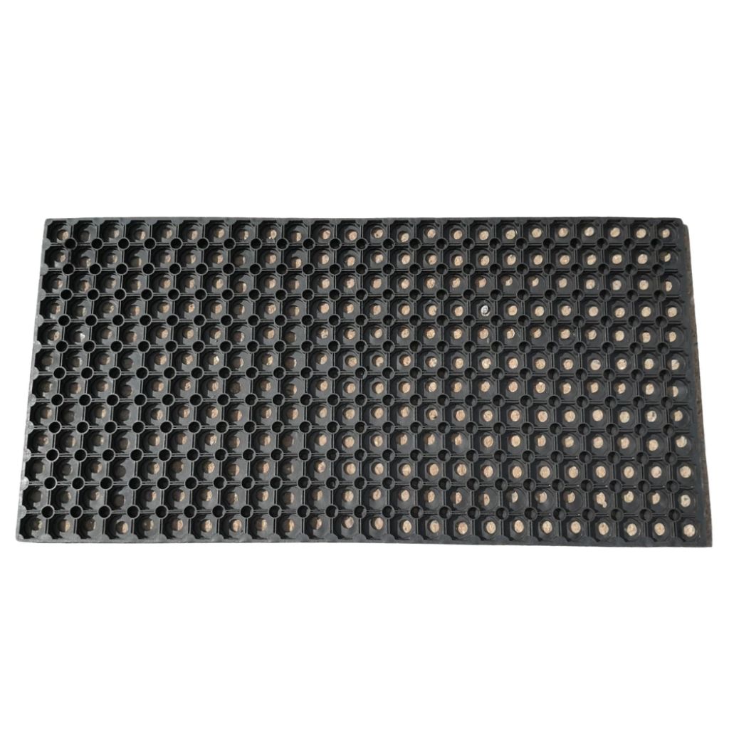 Full overhead view of a 1.5M x 1M black rubber grass mat with a hollow drainage ring design.