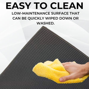 Person cleaning a textured surface with a yellow cloth, text indicating ease of cleaning.