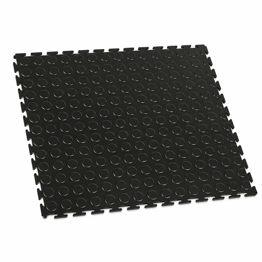 A black interlocking foam play mat with a raised circular texture, shown at an angle on a plain white background.