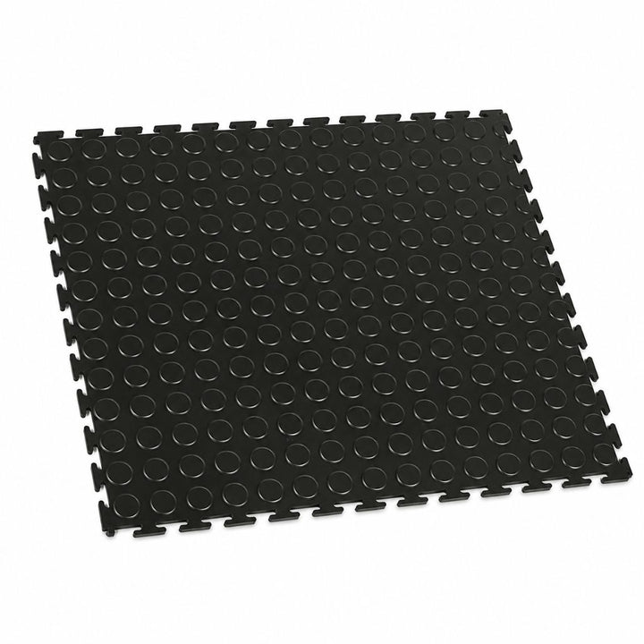A black interlocking foam play mat with a raised circular texture, shown at an angle on a plain white background.